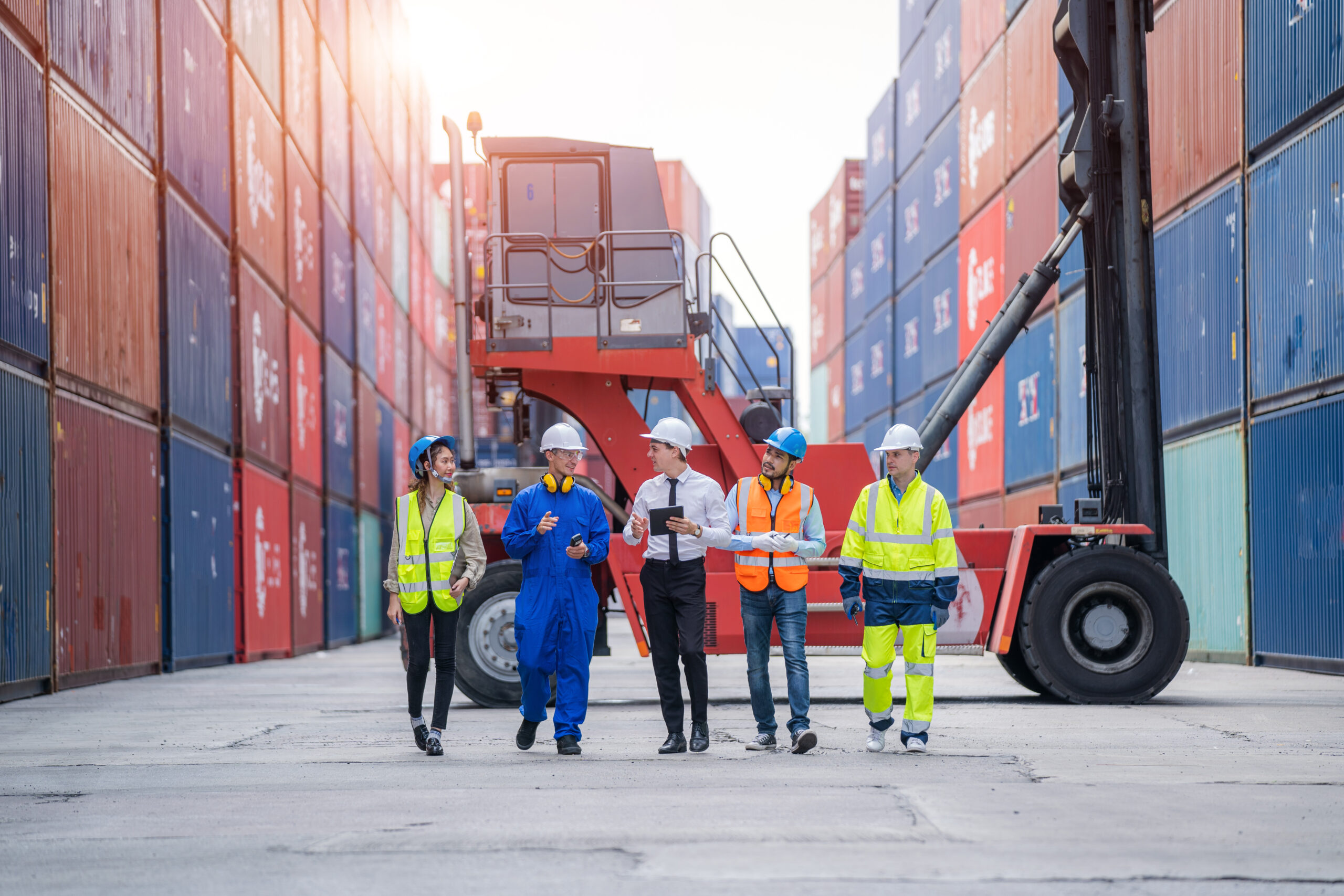 Manager and Cargo container worker having discussion on working